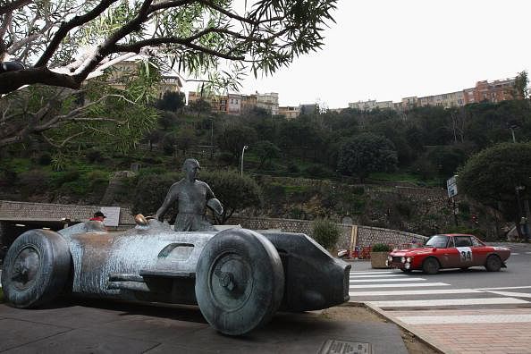 Gianmaria Aghem and Diego Cumino of Italy in a Lancia Fulvia HF 1.6 (1970) drive past the statue of Formula one legend Juan Manuel Fangio during the 12th Monte Carlo Historical Rally on January 31, 2009 in Monte Carlo, Monaco. Over three hundred cars are entered in four different age categories, all having competed in at least one of the Monte Carlo rallies. The cars compete in sixteen stages over four days in the south-east region of France. (Photo by Michael Steele/Getty Images)